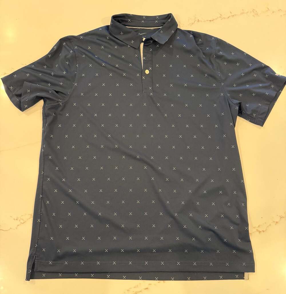 Nike Golf Dri-FIT Men's All-Over Crossed Golf Club Print Polo Shirt